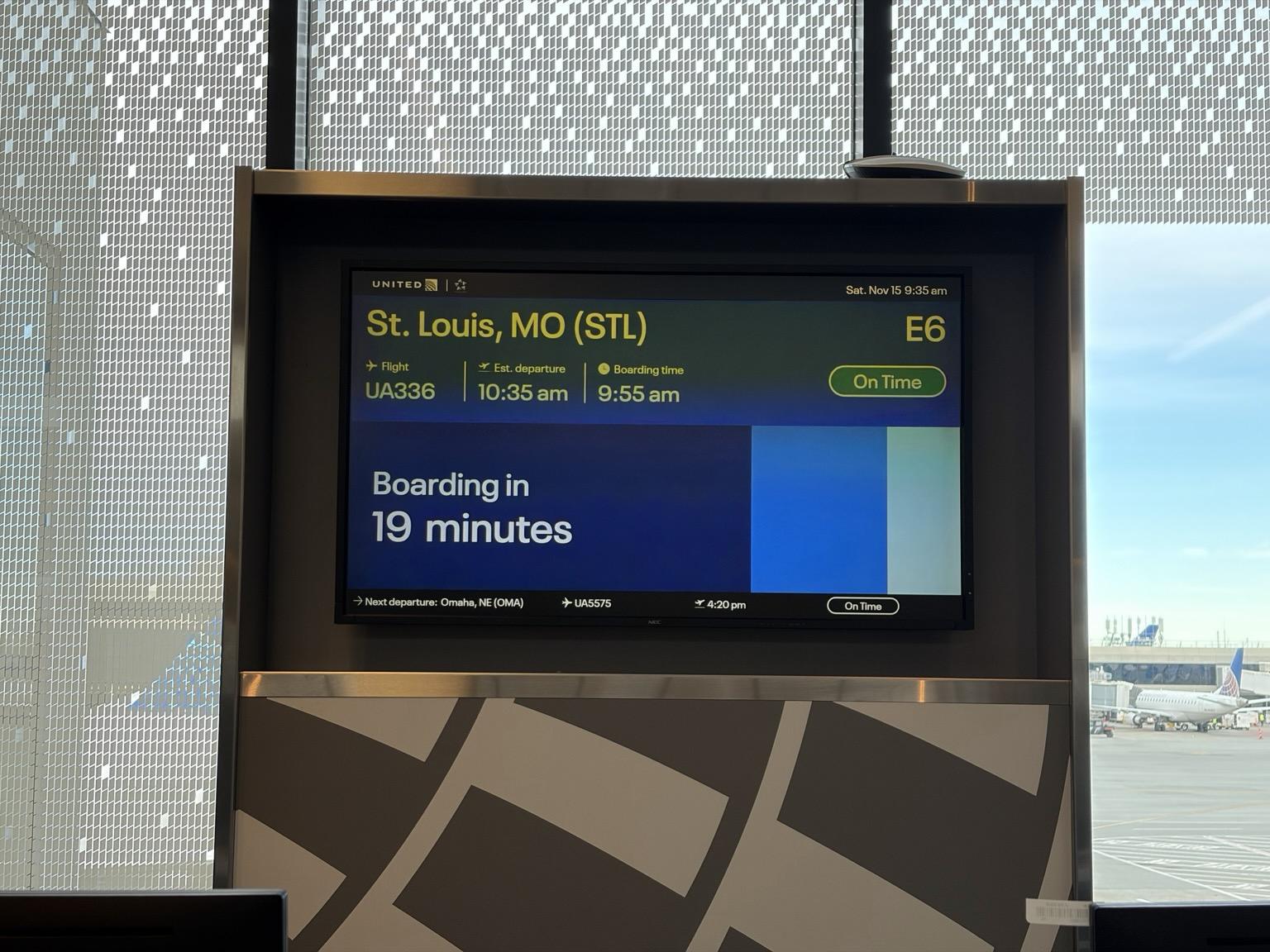 Airport TV screen with flight information to St. Louis